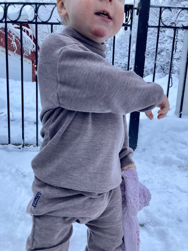 Jumper with high neck in merino wool