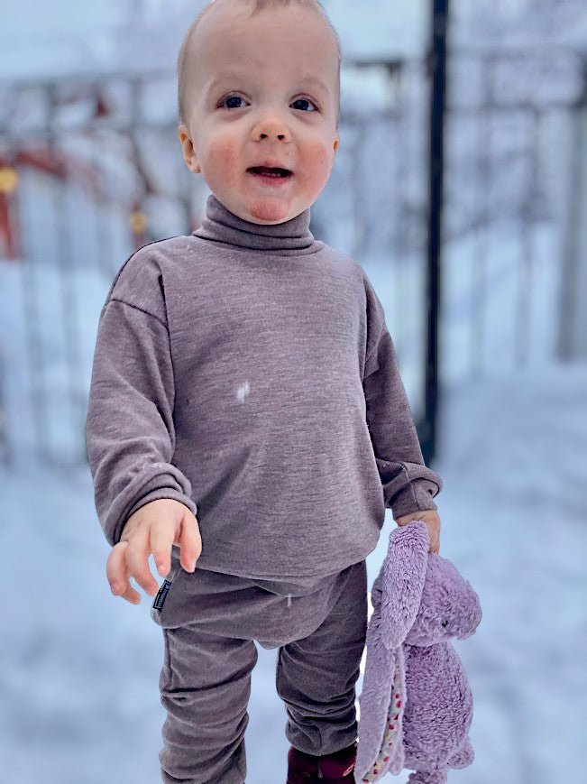 Jumper with high neck in merino wool